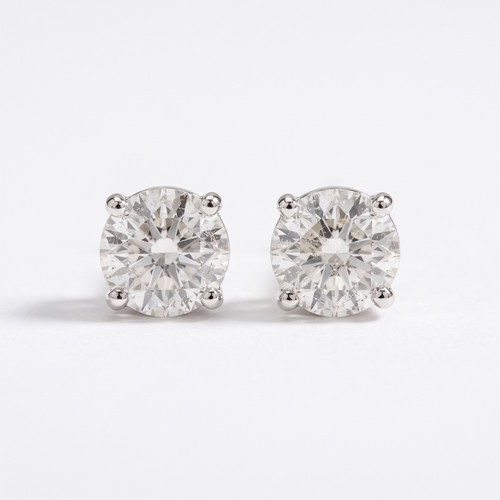 1/4 - 2 Ct T.W. Natural Diamond Studs in 14k White or Yellow Gold